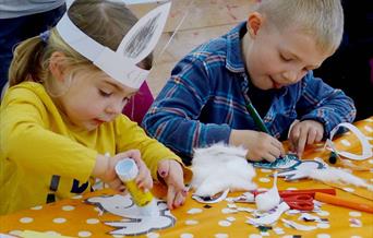 An image of children doing craft. Photograph by Brian Nicholson