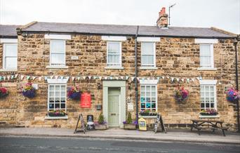 An image of the exterior of The Oak Wheel