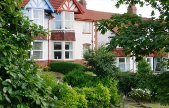 An exterior image of White Acre
