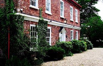 An exterior image of Wrangham House Hotel
