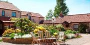 An image of Keld Head Farm Cottages - Courtyard