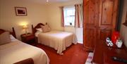 An image of a twin bedroom at The Blacksmiths Arms.