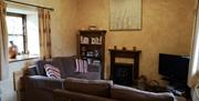 An image of North End Farm Piglet Cottage living room