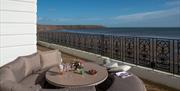 An image of seating on a balcony at 5 Leys Holiday Accommodation
