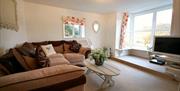 An image of the living room at Chain Bridge Cottage - Owners Cottages