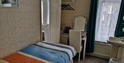 An image of Phoenix Guest House - Family room