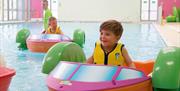 An image of a child on a float in the pool at Reighton Sands Holiday Park