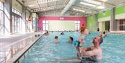 An image of families at the pool at Reighton Sands Holiday Park