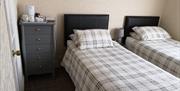 An image of Phoenix Guest House - Twin bedroom
