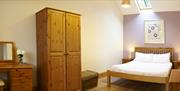 An image of a Filey Holiday Cottages bedroom