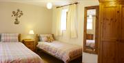 An image of a Filey Holiday Cottages twin bedroom