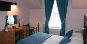 image of the beach hotel bedroom