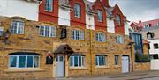 An image of front of The Beach Hotel