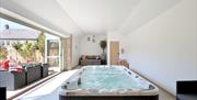 An image of the large hot tub room at The Yard