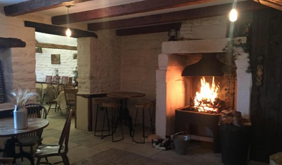 An image of The Stables Restaurant and open fire