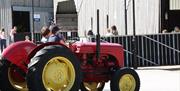 an image of children on a tractor at Playdale Farm Park