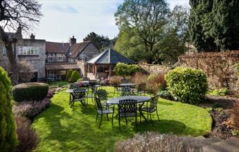 An image of The Black Swan Hotel - Garden and seating