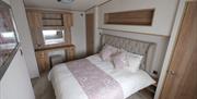 An image High Straggleton Farm Caravan Site bedroom