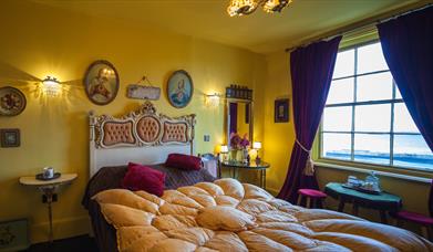 An image of a bedroom at La Rosa Hotel