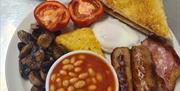 An image of a full English from the Stained Glass Centre café