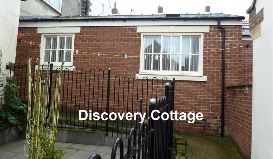 An image of the outside of Discovery Cottage