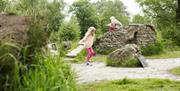 An image of two children playing at Sutton Bank National Park Centre