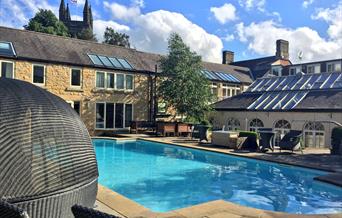 An image of the outdoor swimming pool at The Feversham Arms Hotel & Verbena Spa