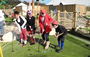 An image of children playing on the sea life pirate adventure golf