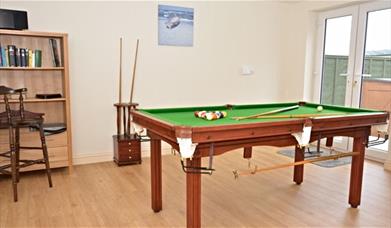 An image of a games room at a Big Domain accommodation