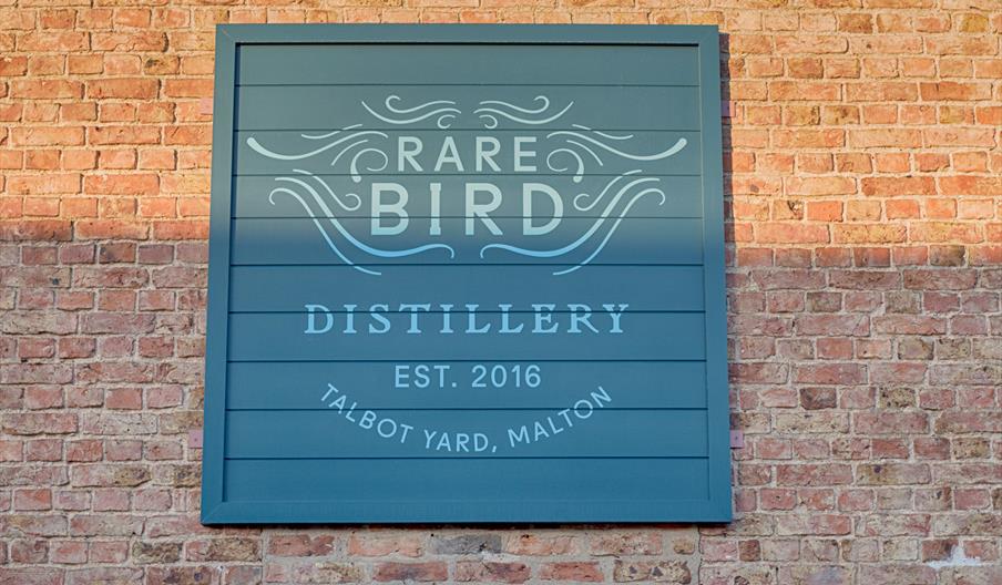 An image of Rare Bird Distillery sign