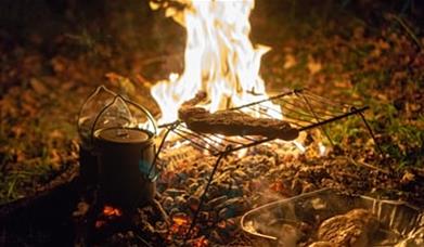 An Image of a Camp Fire at Rugged Outdoors