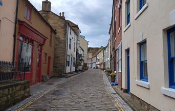 An image of the main street in Staithes by photographer, Jim Wallis