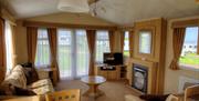 An image of High Straggleton Farm Caravan Site living room