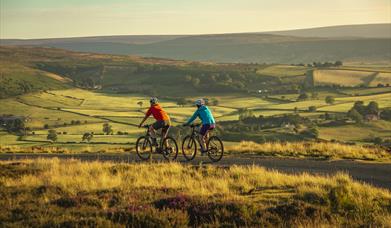 An image of two cyclists on the Pickering to Langdale End Cycle Route